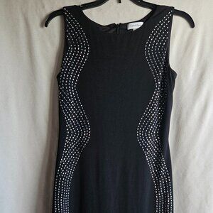 Calvin Klein size 4 dress, black with silver embellishments on the side.
